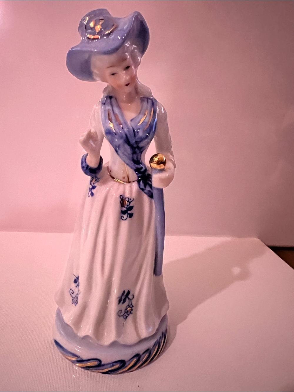 Vintage Porcelain Lady Figurine in White and Light Blue with Gold Accents